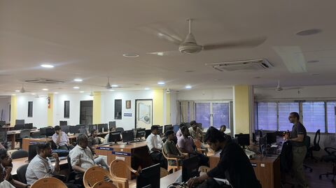 Deep-dive technical workshop session in progress with attendees